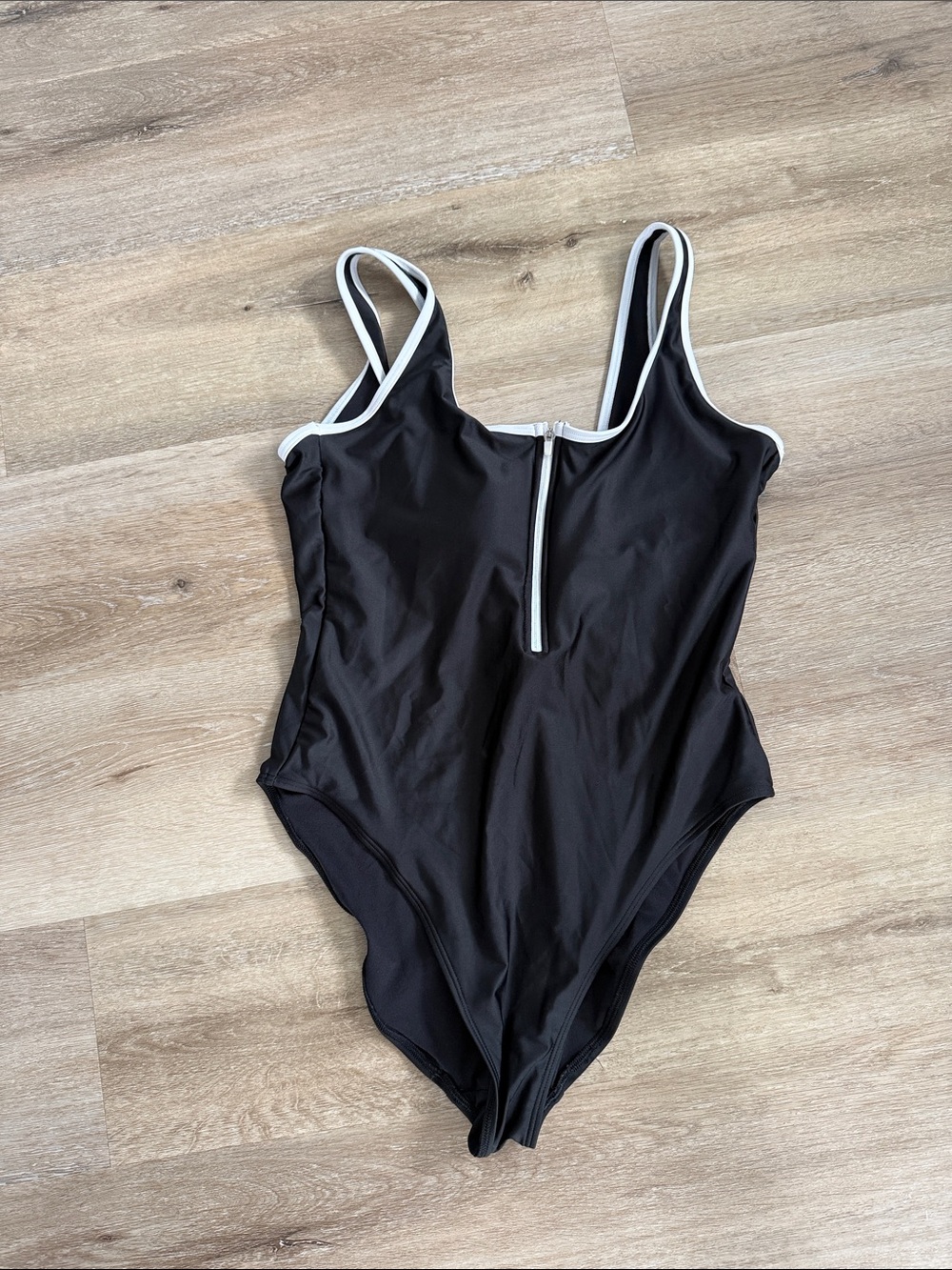 Black One-Piece Swim Suit with White Trim and zipper detail